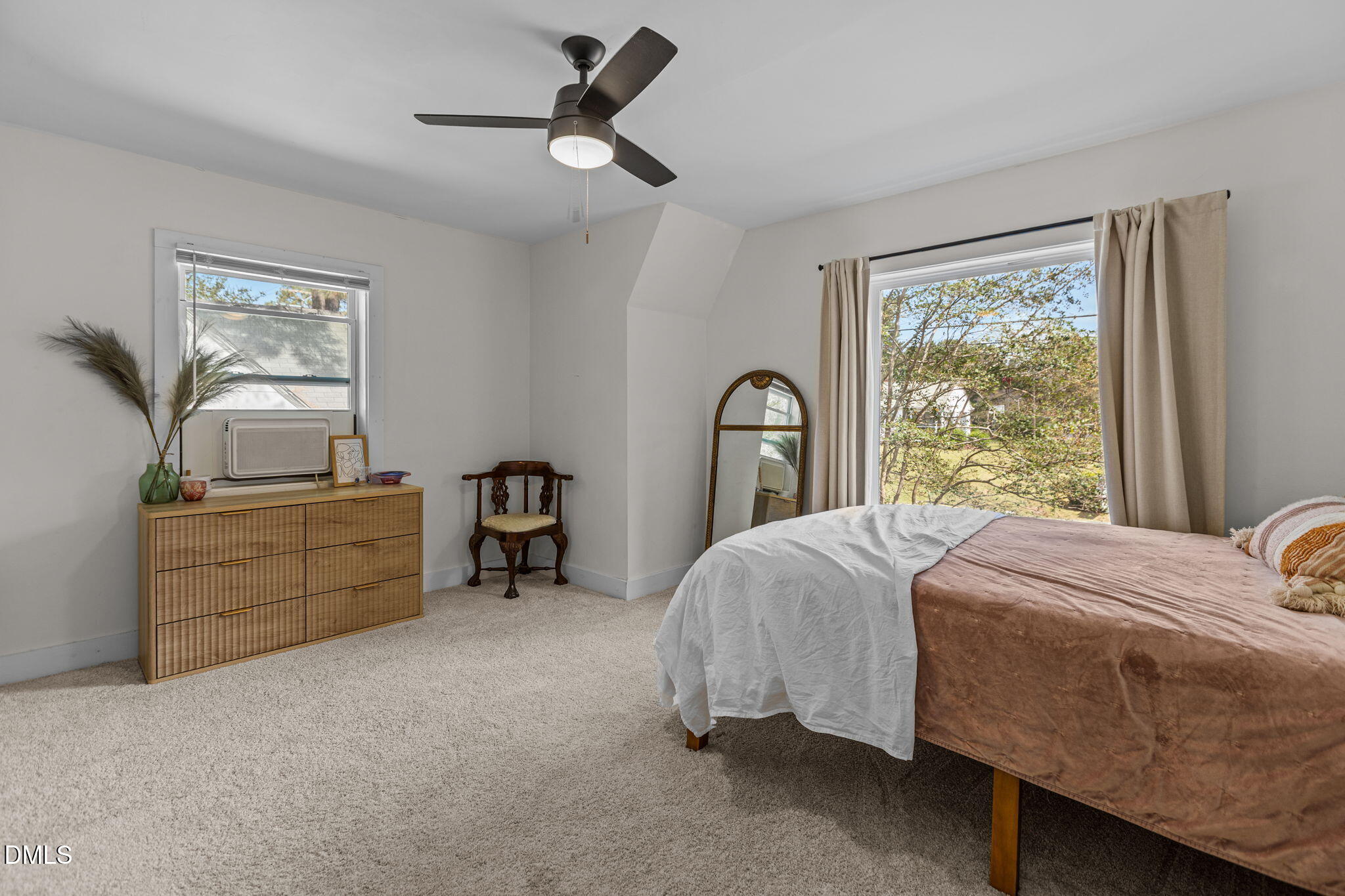 2707 North Roxboro Street Durham, NC 27704 - Photo 24 of 44 a bed room with a bed and a window