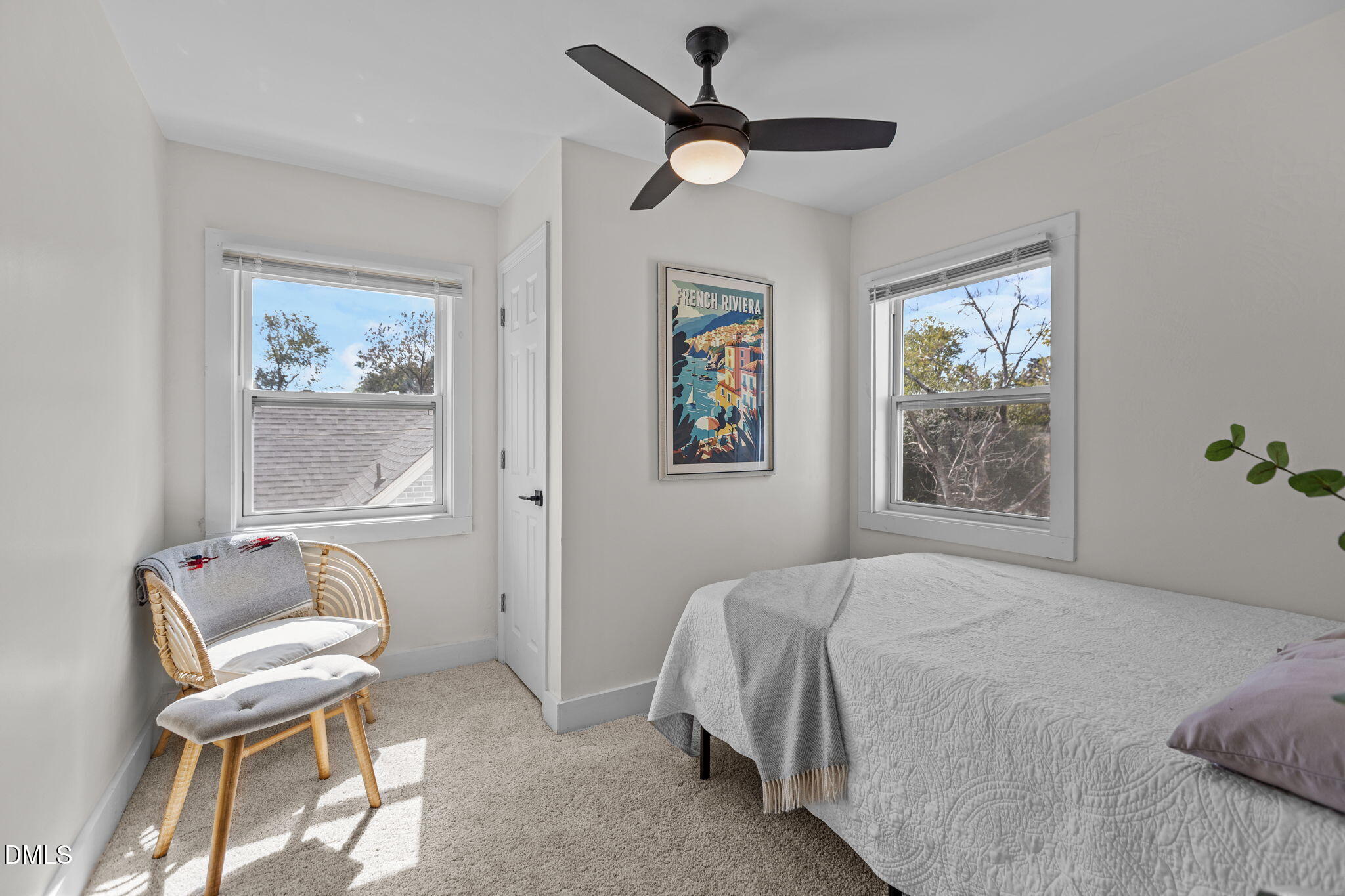 2707 North Roxboro Street Durham, NC 27704 - Photo 25 of 44 a bedroom with a bed and chair