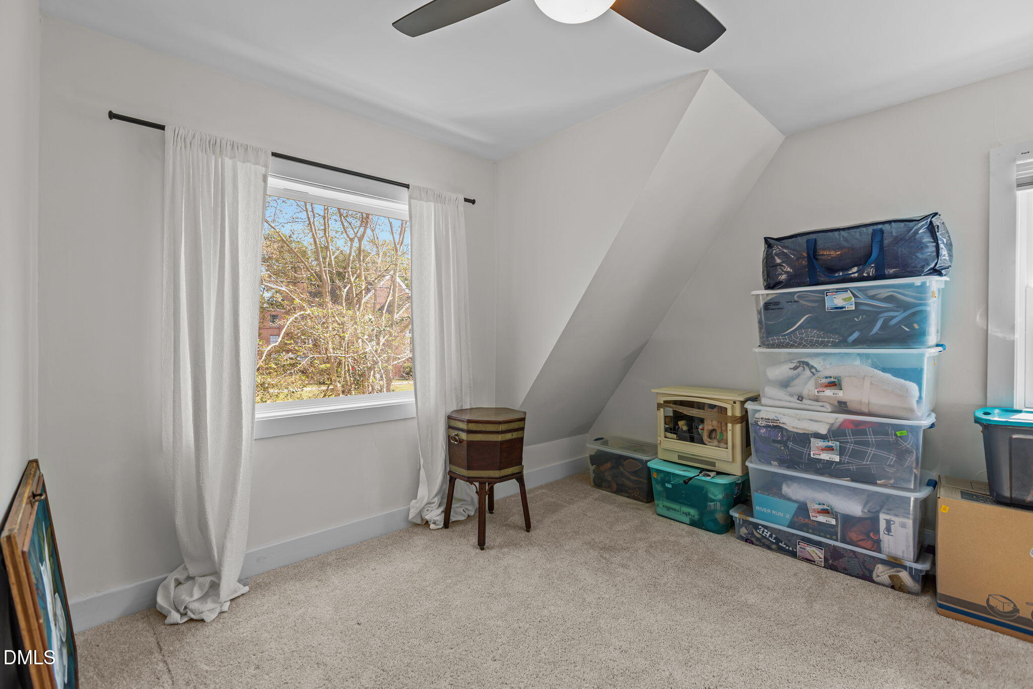 2707 North Roxboro Street Durham, NC 27704 - Photo 28 of 44 a view of a workspace with furniture and a window