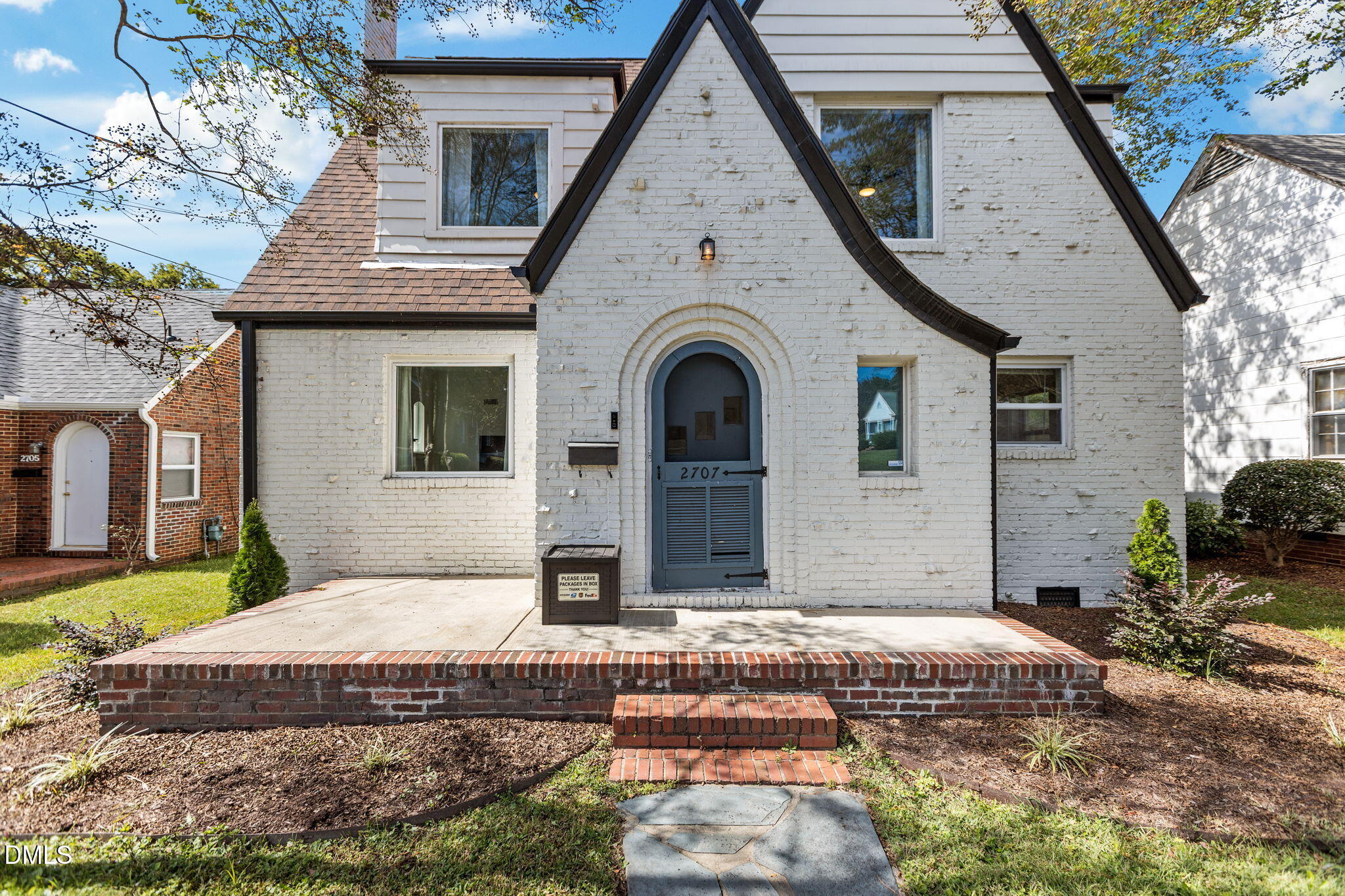 2707 North Roxboro Street Durham, NC 27704 - Photo 32 of 44 a view of a house with backyard