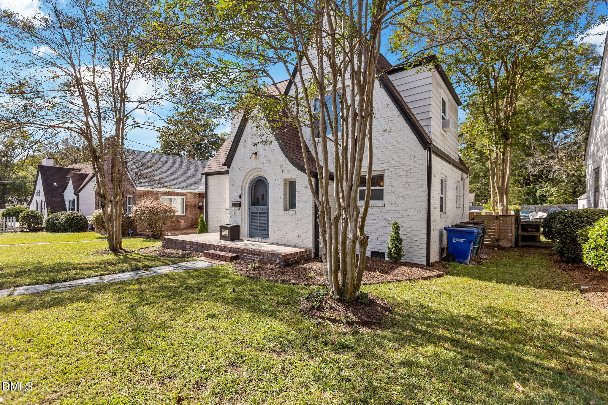 2707 North Roxboro Street Durham, NC 27704 - Photo 33 of 44 a view of a house with swimming pool and sitting area