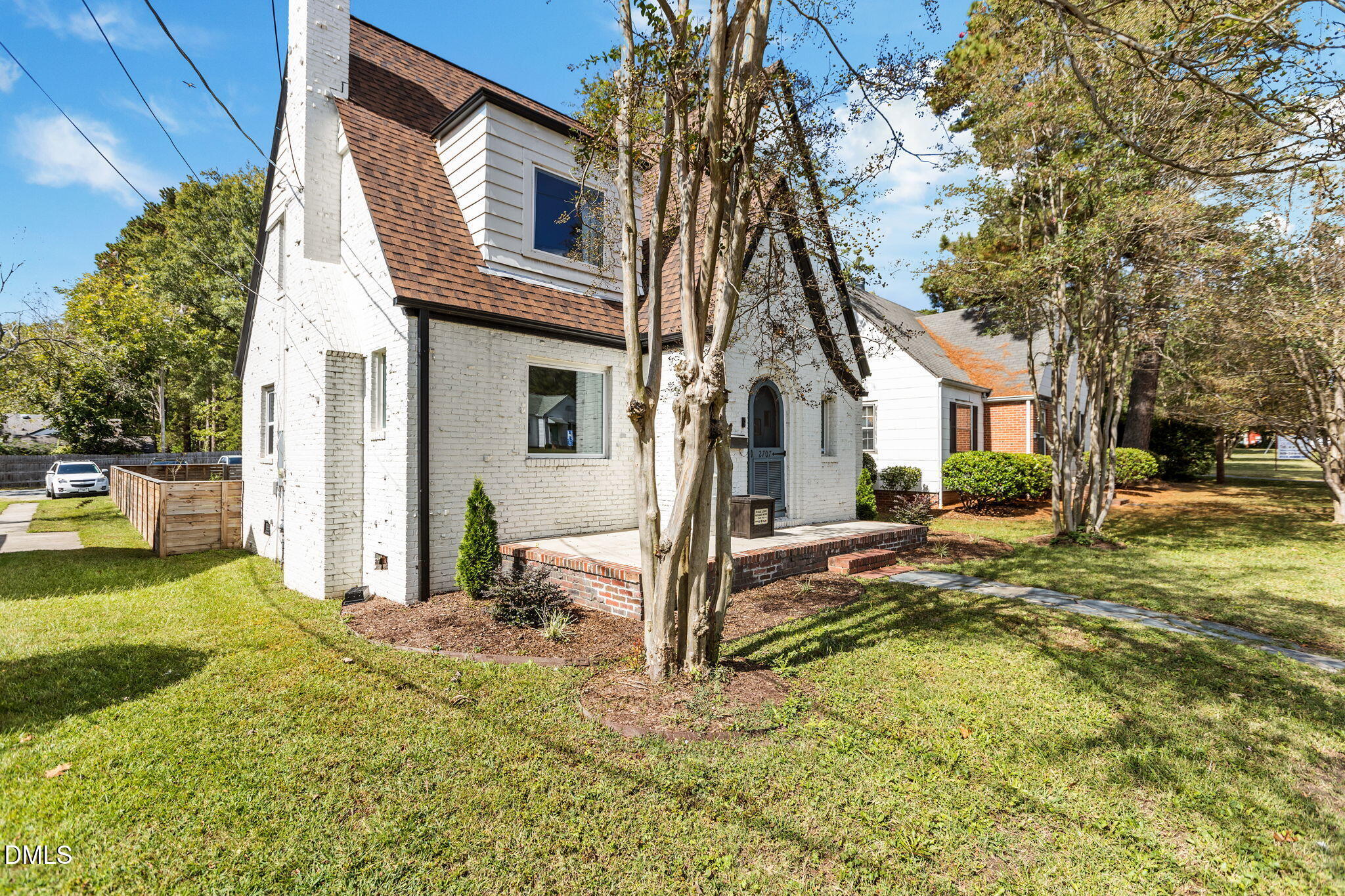 2707 North Roxboro Street Durham, NC 27704 - Photo 34 of 44 a view of a house with backyard and sitting area