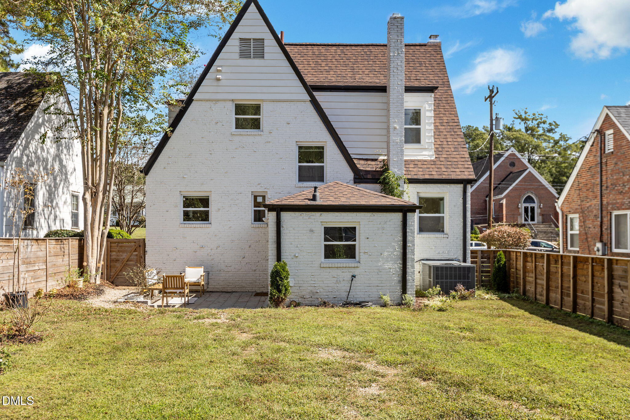 2707 North Roxboro Street Durham, NC 27704 - Photo 37 of 44 a front view of house with yard and trees in the background