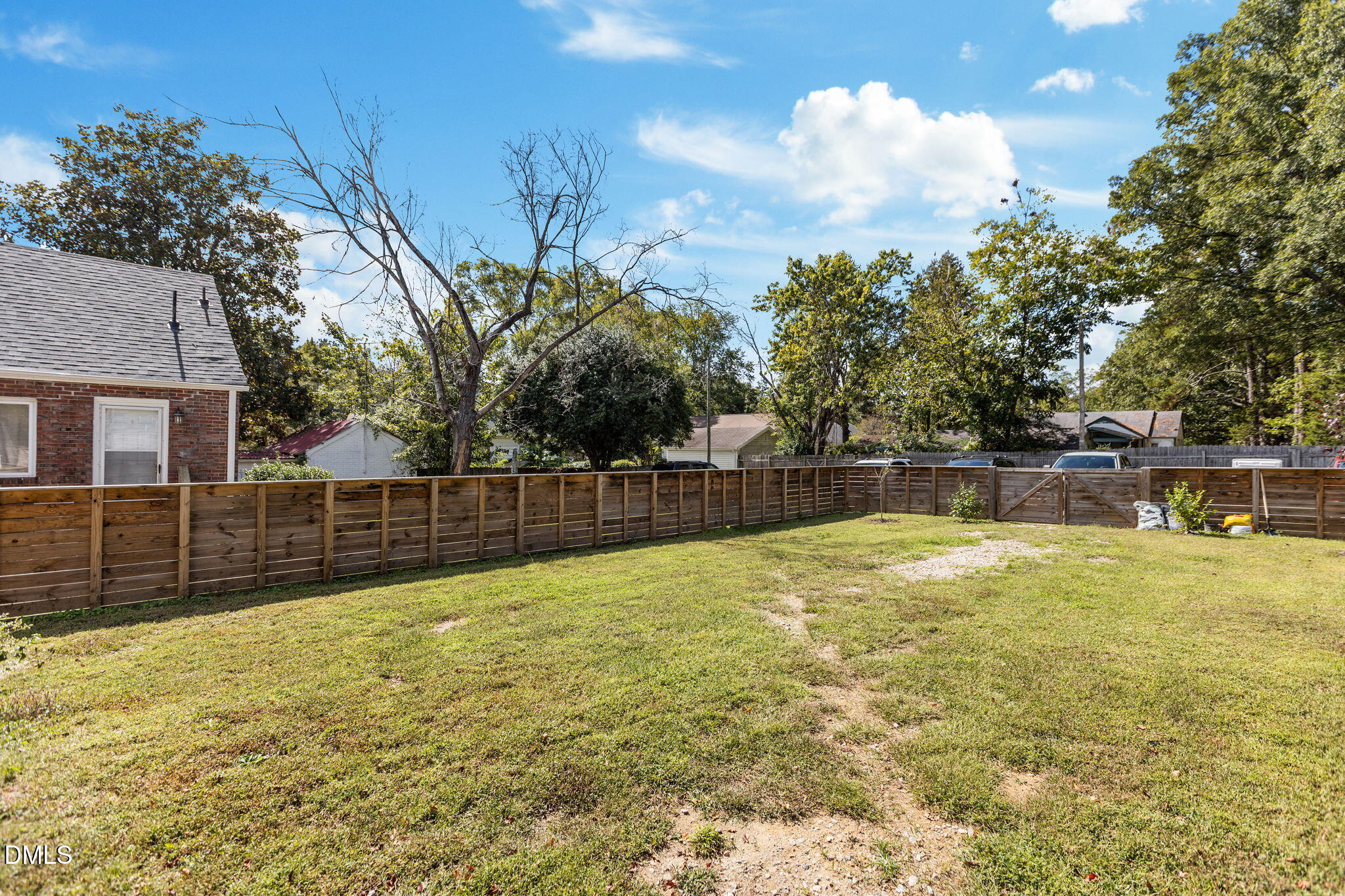 2707 North Roxboro Street Durham, NC 27704 - Photo 38 of 44 a swimming pool with wooden fence