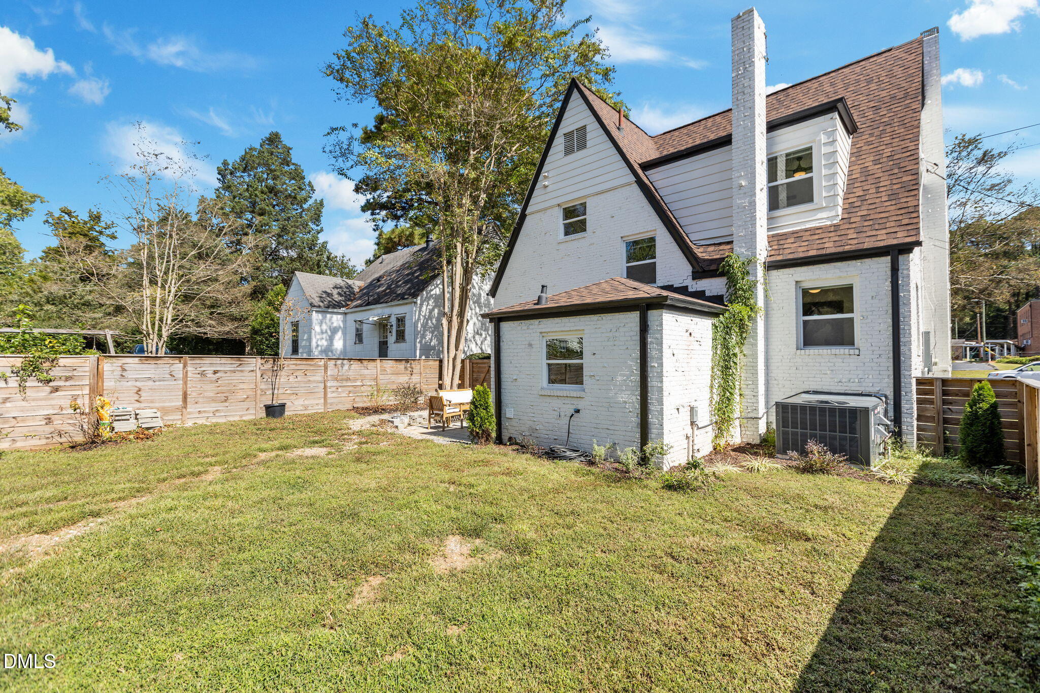 2707 North Roxboro Street Durham, NC 27704 - Photo 40 of 44 a front view of a house with a yard