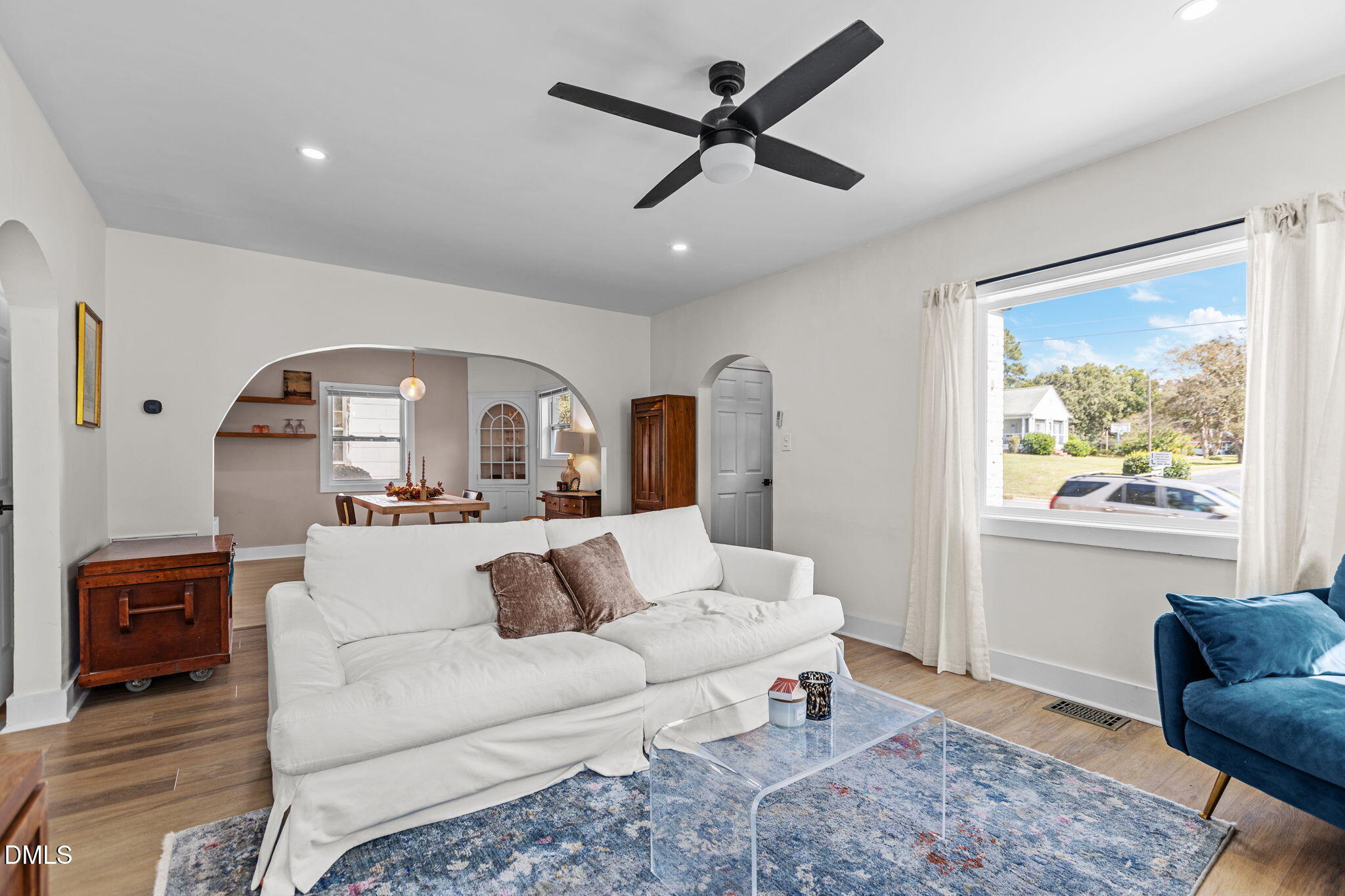 2707 North Roxboro Street Durham, NC 27704 - Photo 5 of 44 a living room with furniture and a large window
