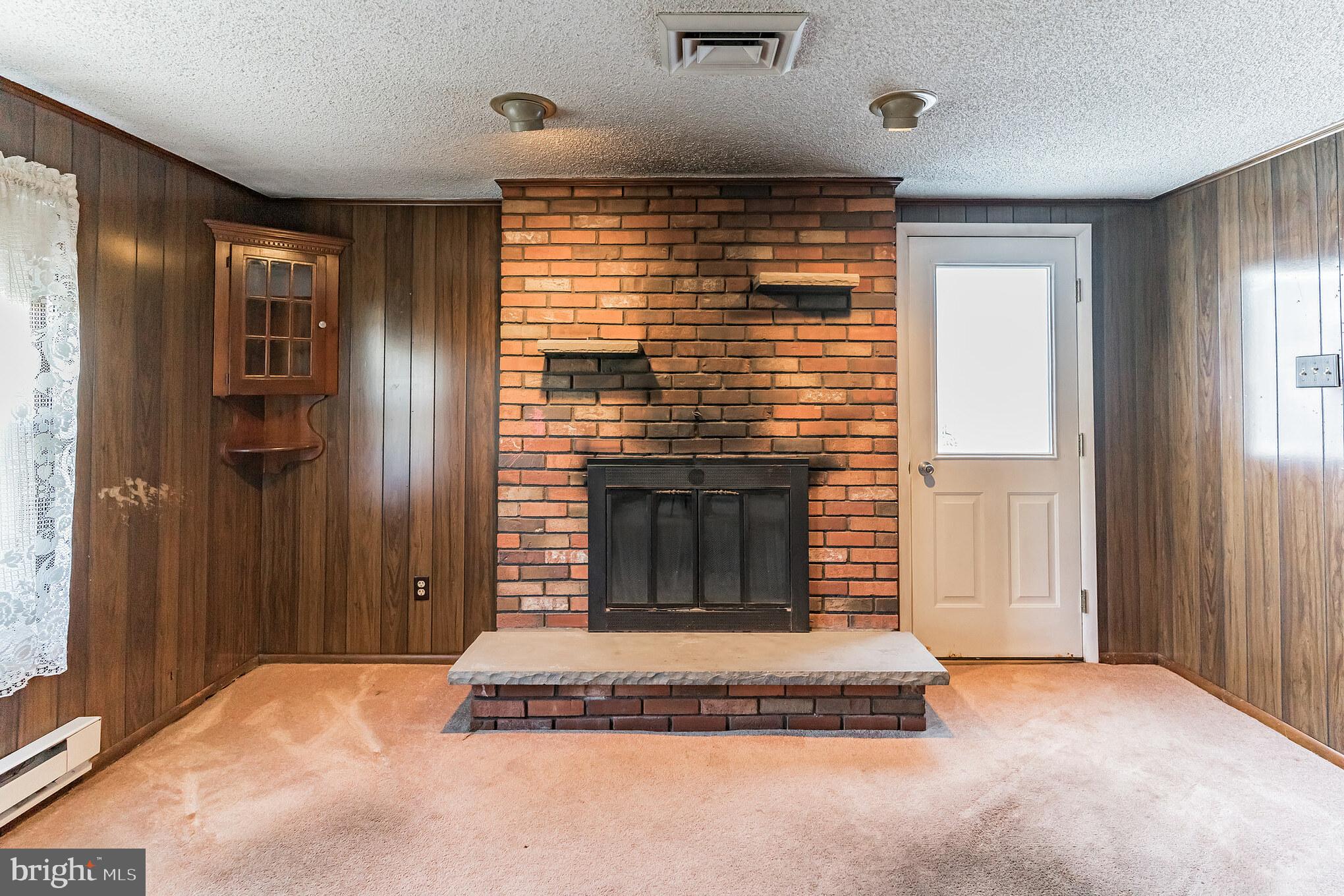 219 Broadway Hammonton, NJ 08037 - Photo 9 of 44 Den fireplace