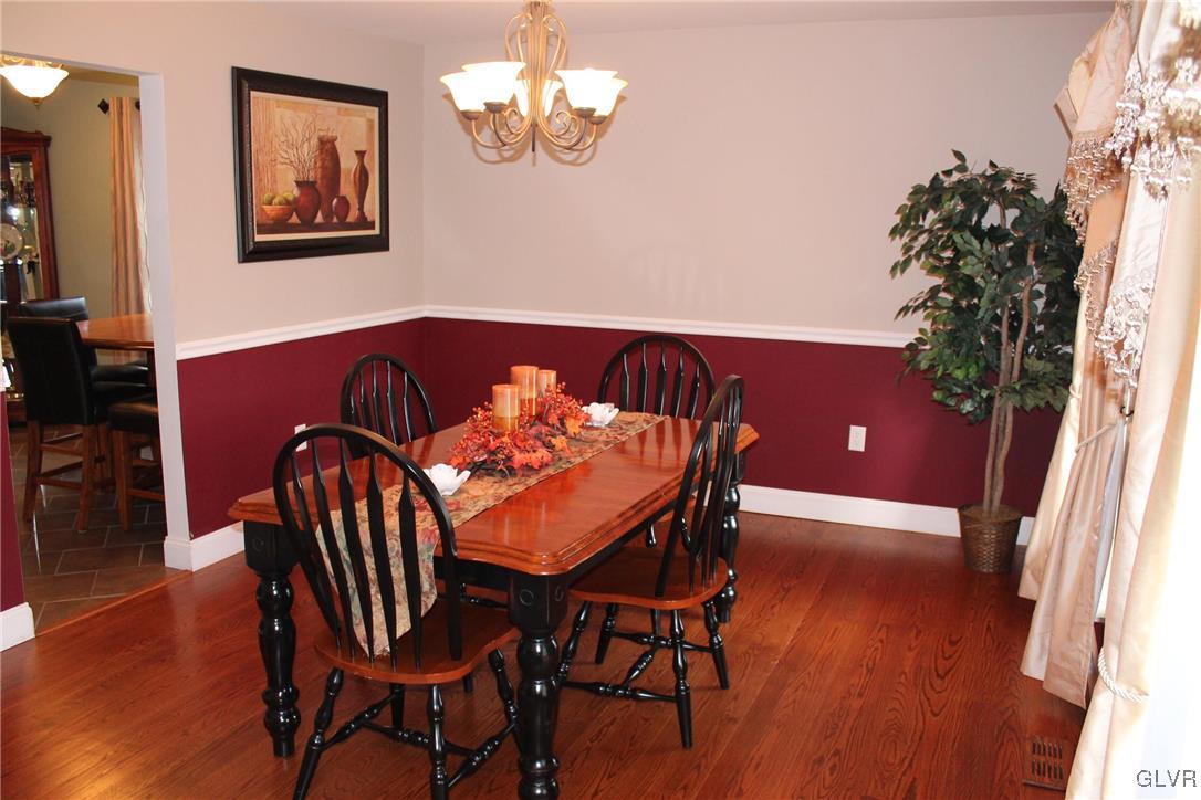6435 Jacksonville Road Bath, PA 18014 - Photo 8 of 24 DINING ROOM WITH CHAIR RAIL AND HARDWOOD FLOORS