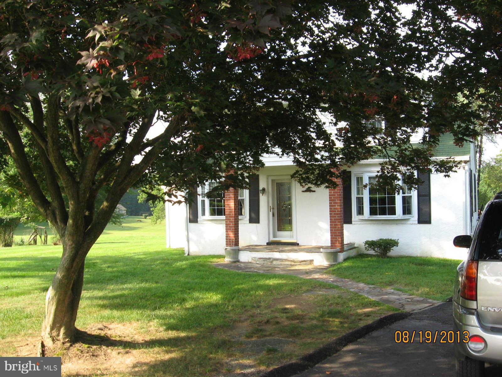 315 Bryants Nursery Road Silver Spring, MD 20905 - Photo 3 of 24 a front view of a house with a yard