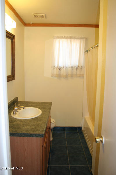 3235 West Greenway Road Phoenix, AZ 85053 - Photo 4 of 7 Hall batroom
