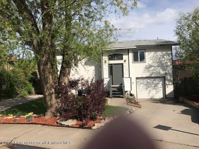 520 Elm Court Rifle, CO 81650 - Photo 2 of 37 a view of a house with a tree in front