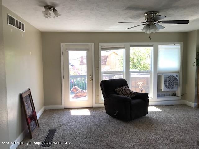 520 Elm Court Rifle, CO 81650 - Photo 32 of 37 a living room with furniture and a window