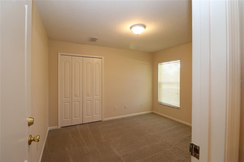 605 Cheviot Court Apopka, FL 32712 - Photo 23 of 32 a view of an empty room with a window