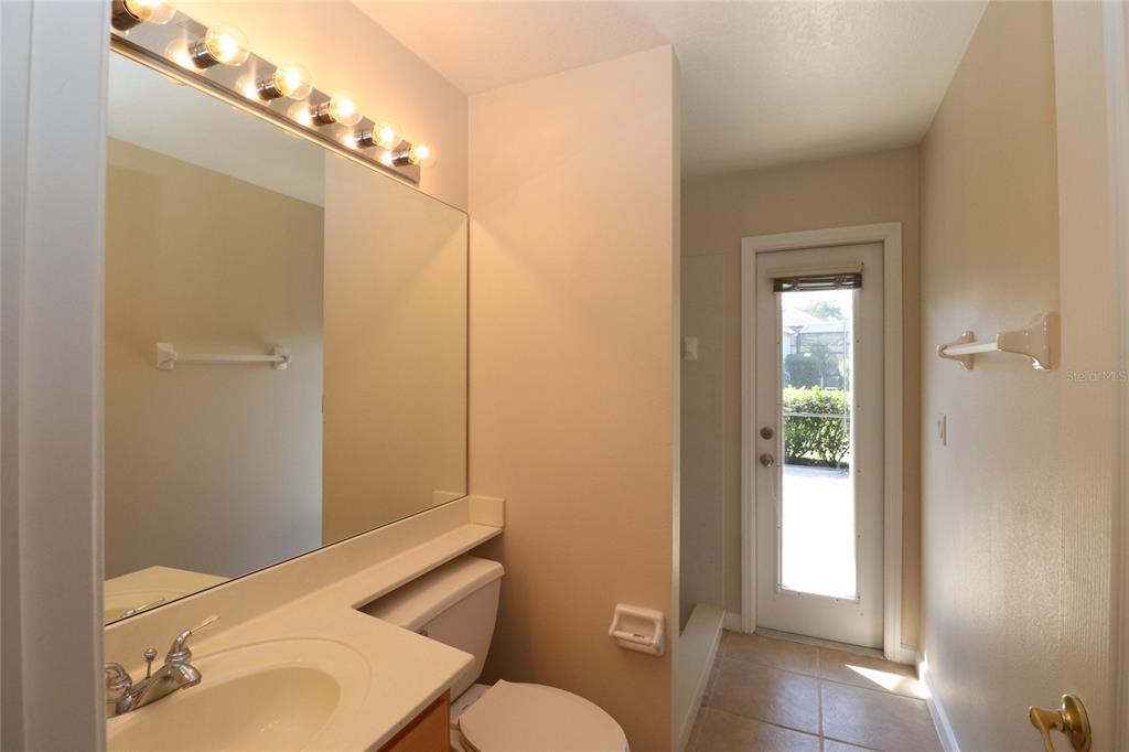 605 Cheviot Court Apopka, FL 32712 - Photo 30 of 32 a bathroom with a toilet a sink and bathtub