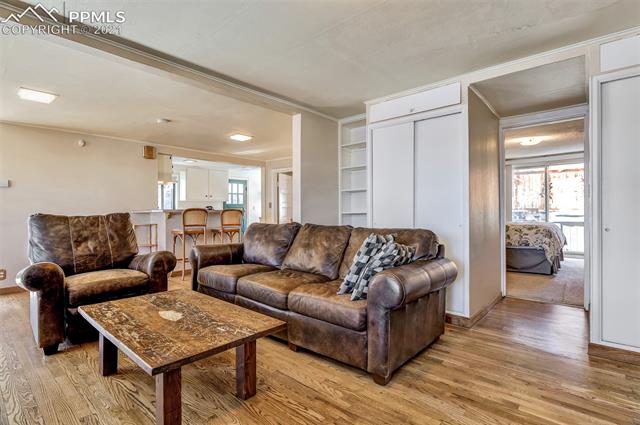 1824 Ridgeway Avenue Colorado Springs, CO 80906 - Photo 11 of 19 Living room towards kitchen and master