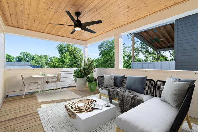 a outdoor living space with furniture and garden view