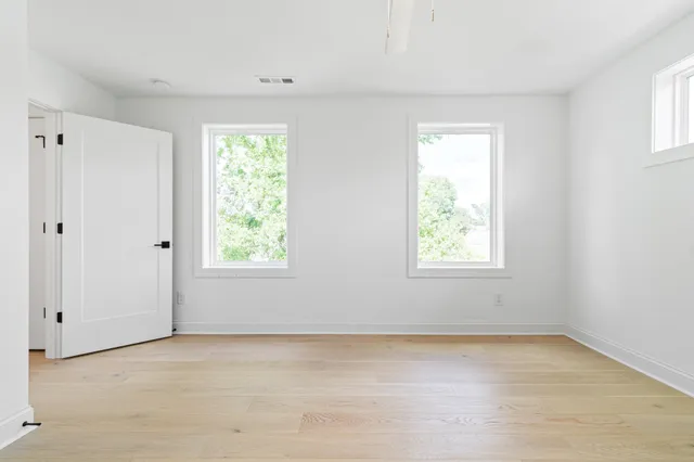an empty room with windows