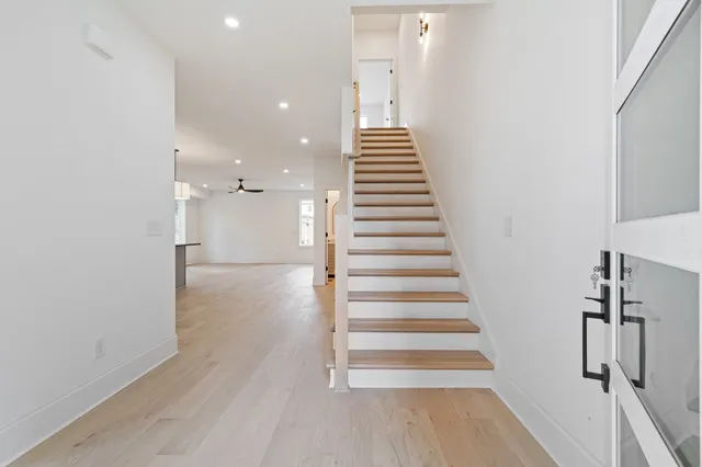 a view of entryway with wooden floor