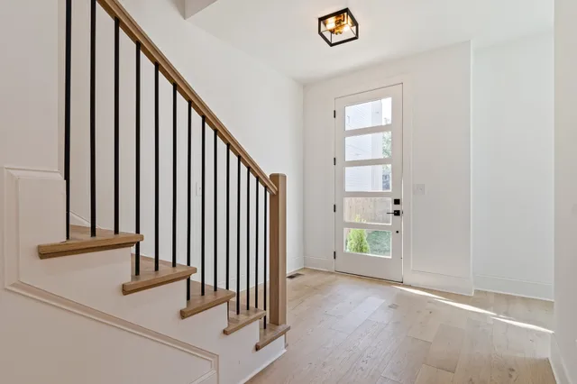 an entryway with a staircase