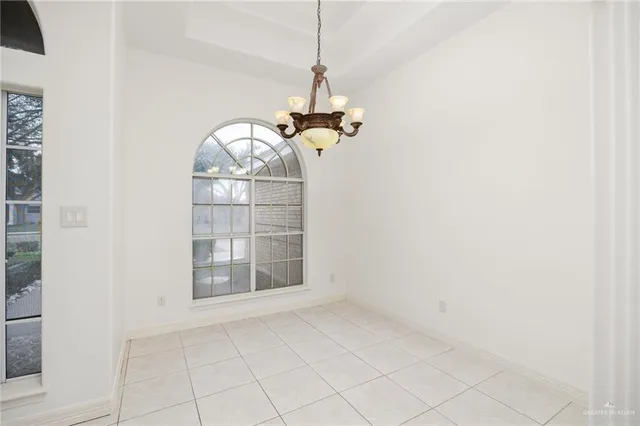 a view of a room with windows