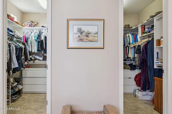an aerial view of residential house and sandy dunes