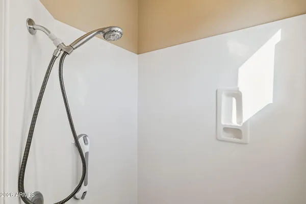 a view of a street with some trees on both side of it