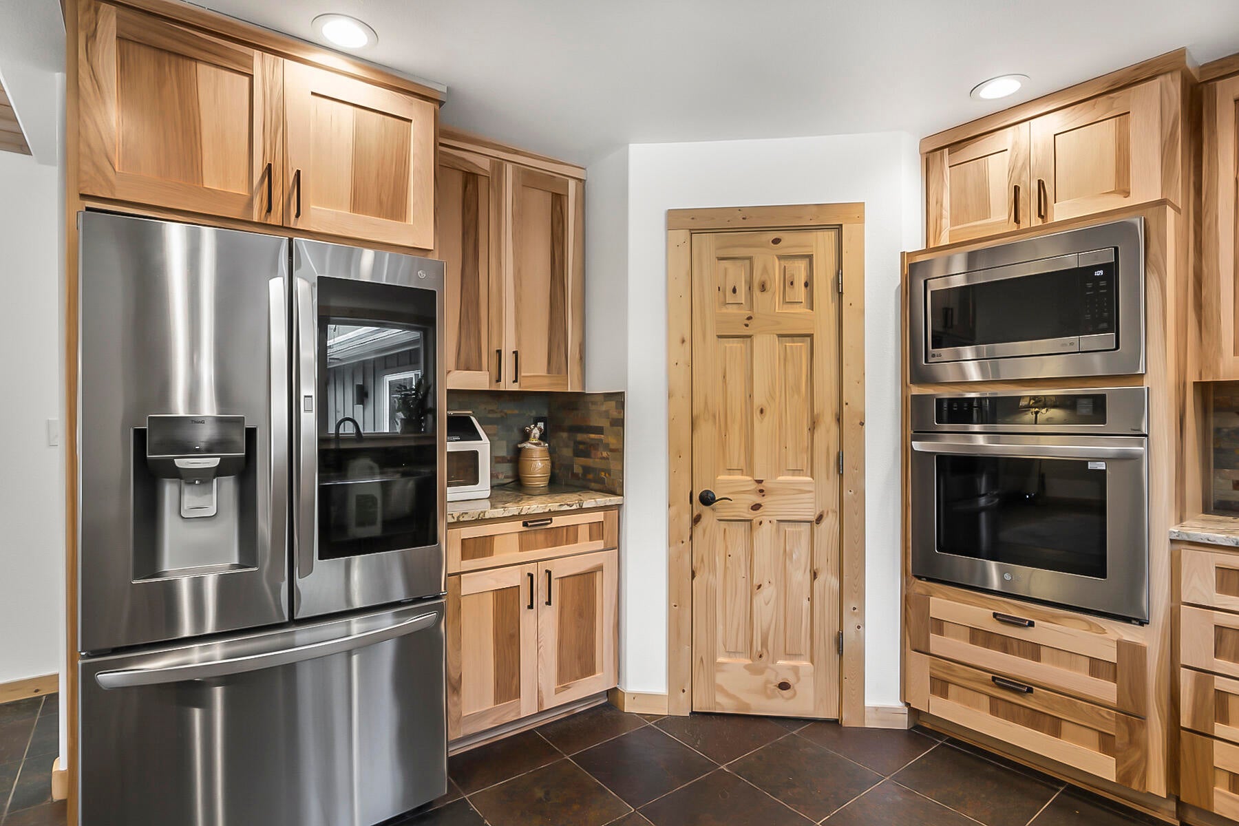 17246 Tholstrup Road Bend, OR 97707 - Photo 16 of 55 Door to pantry