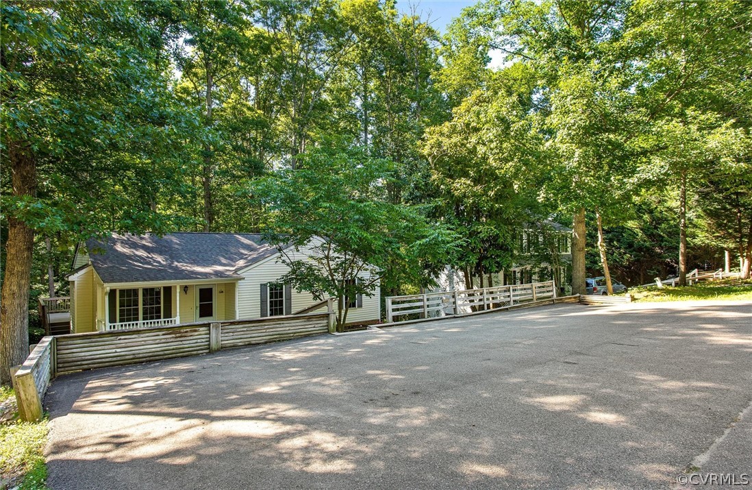 7560 Valencia Road Chesterfield, VA 23832 - Photo 18 of 26 a front view of a house with a yard