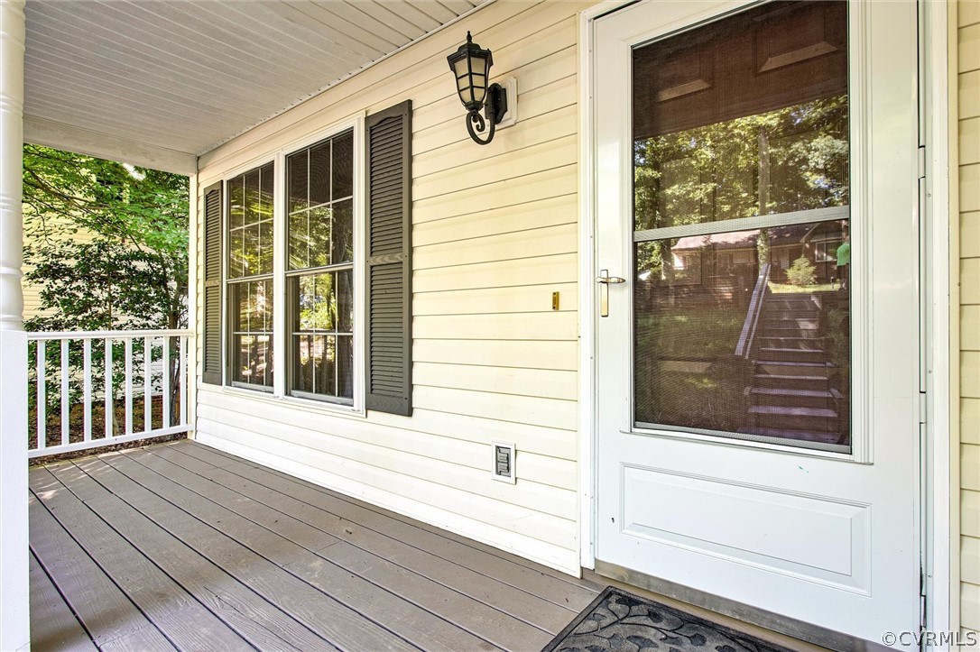 7560 Valencia Road Chesterfield, VA 23832 - Photo 20 of 26 a view of a balcony with wooden floor