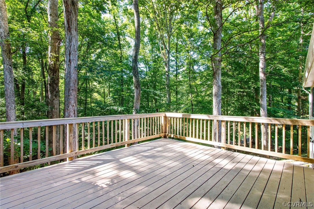 7560 Valencia Road Chesterfield, VA 23832 - Photo 22 of 26 a view of balcony with wooden floor and fence