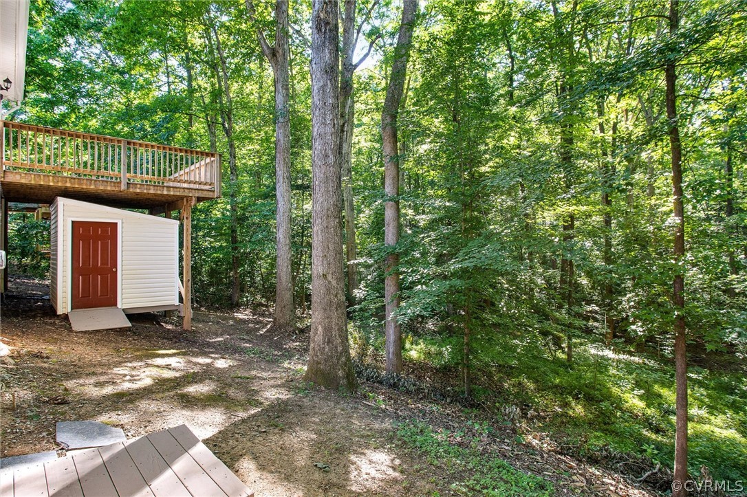 7560 Valencia Road Chesterfield, VA 23832 - Photo 23 of 26 a view of a house with a tree in the yard