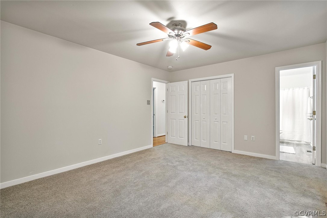 7560 Valencia Road Chesterfield, VA 23832 - Photo 8 of 26 an empty room with closet and fan