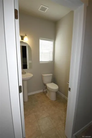 a bathroom with a toilet