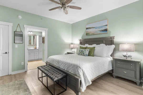 a bedroom with a bed and a dresser