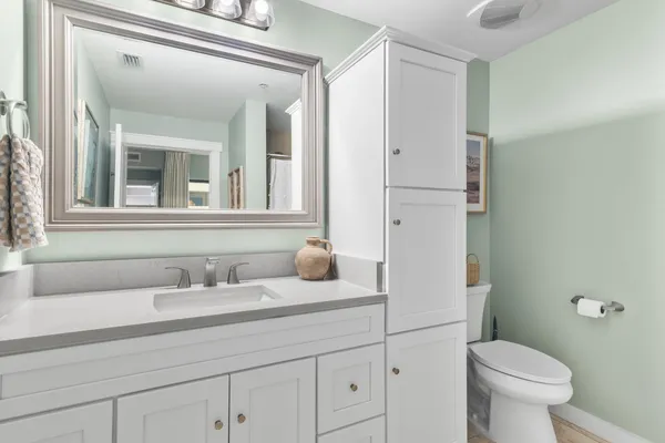 a bathroom with a sink and a toilet