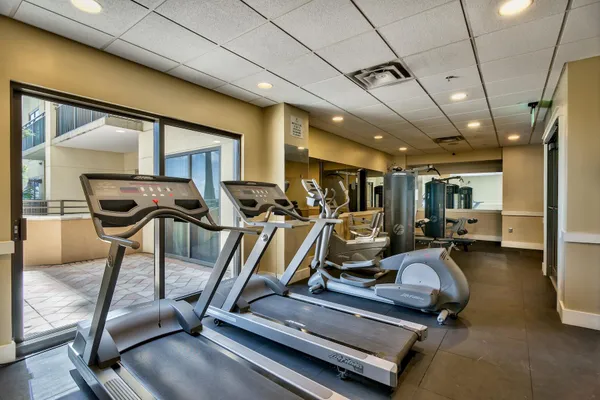 a view of a room with gym equipment