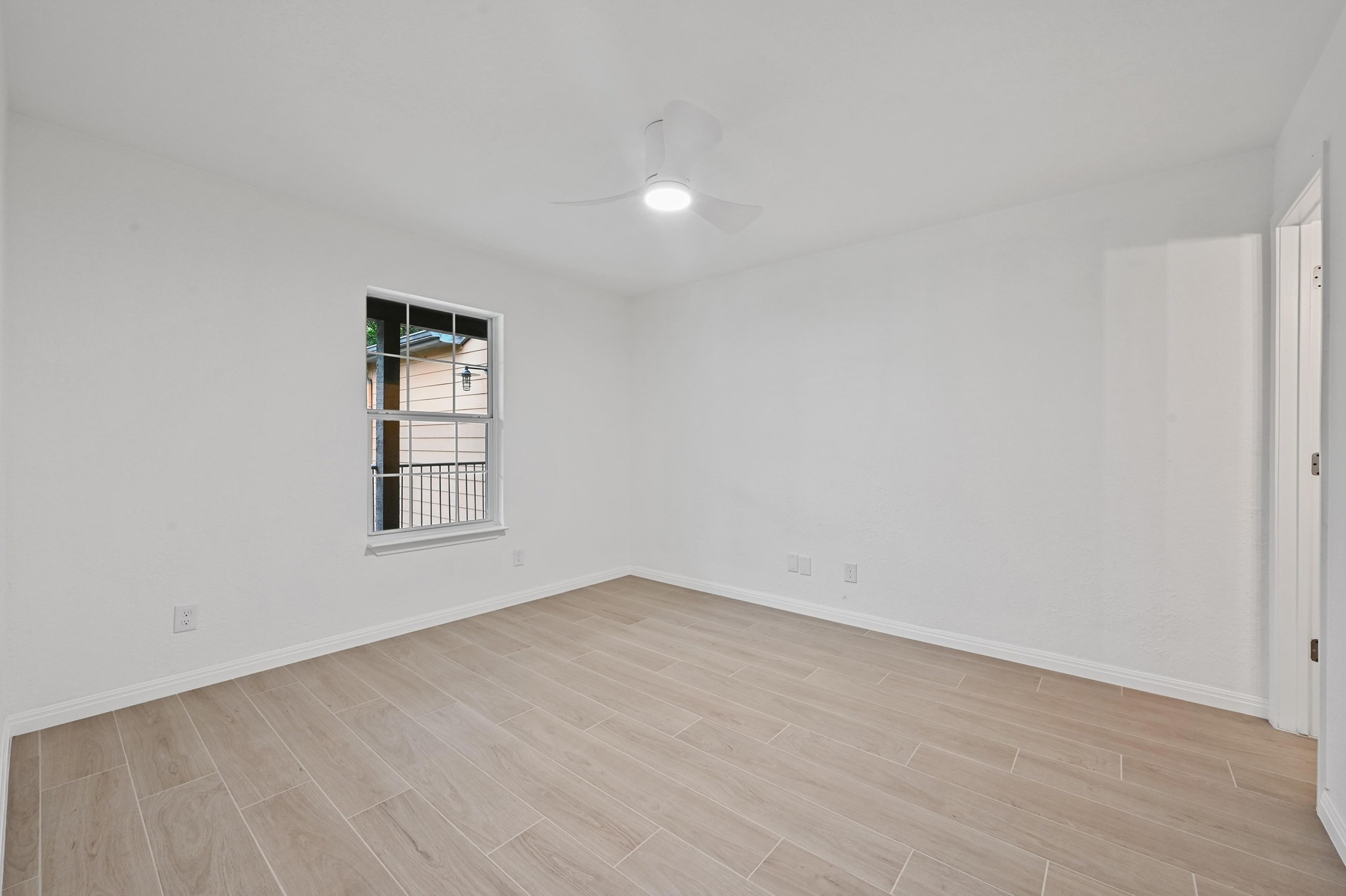 3204 Menchaca Road, Unit 212 Austin, TX 78704 - Photo 15 of 22 an empty room with windows