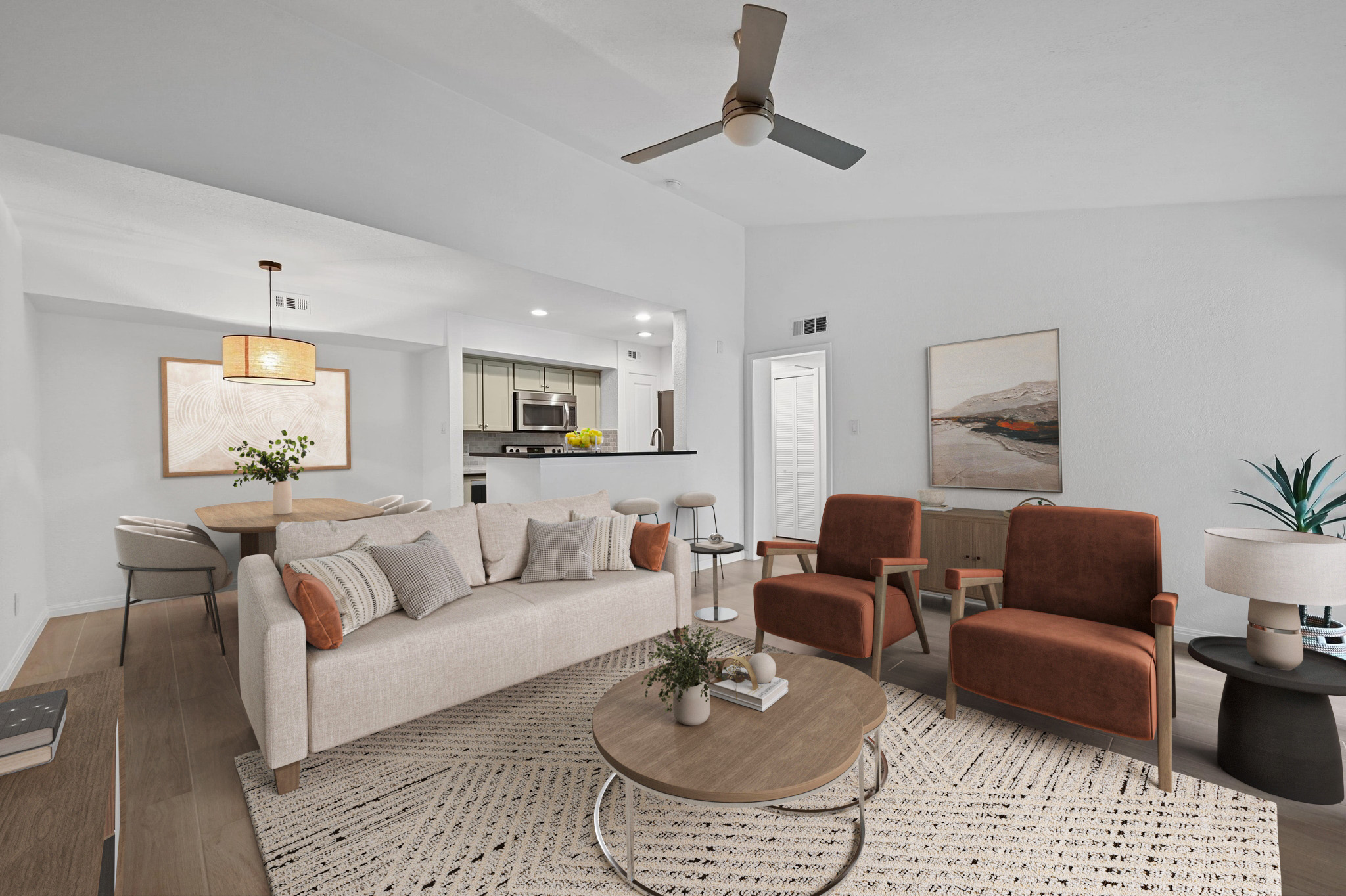 3204 Menchaca Road, Unit 212 Austin, TX 78704 - Photo 2 of 22 a living room with furniture and a wooden floor