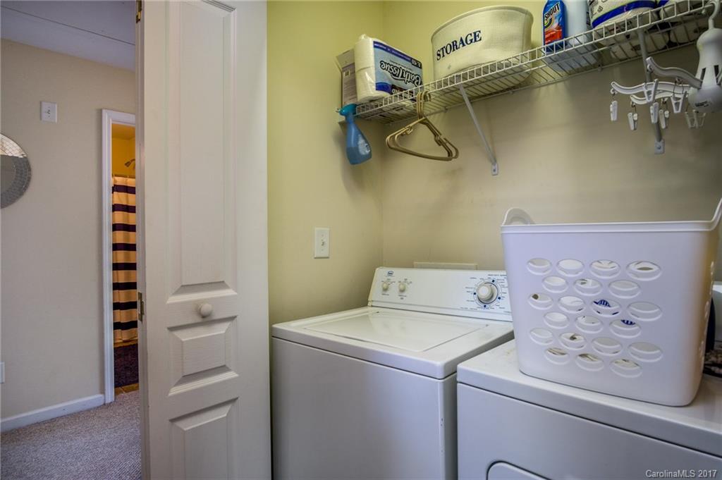 975 Copperstone Lane, Unit 975 Fort Mill, SC 29708 - Photo 14 of 23 a utility room with dryer and washer