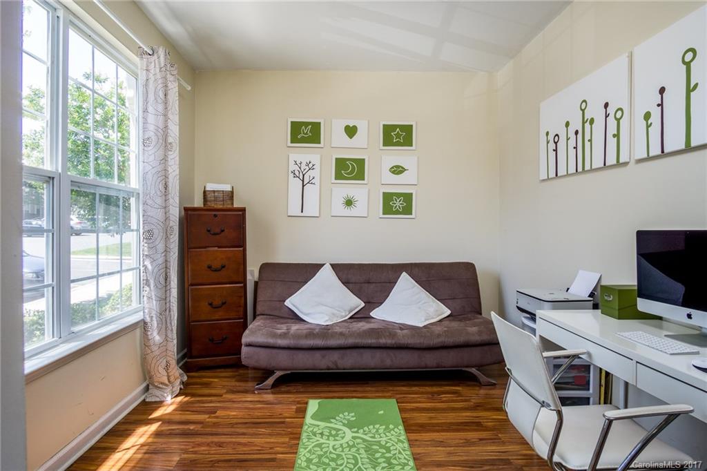 975 Copperstone Lane, Unit 975 Fort Mill, SC 29708 - Photo 5 of 23 a bedroom with a bed and a window