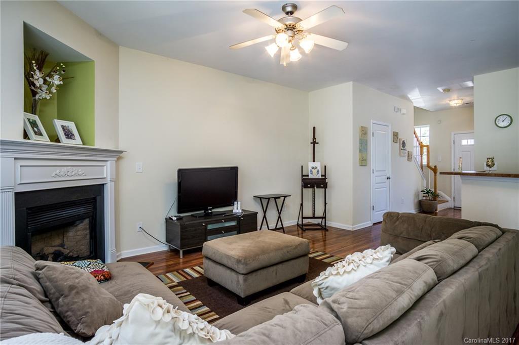 975 Copperstone Lane, Unit 975 Fort Mill, SC 29708 - Photo 10 of 23 a living room with furniture and a fireplace