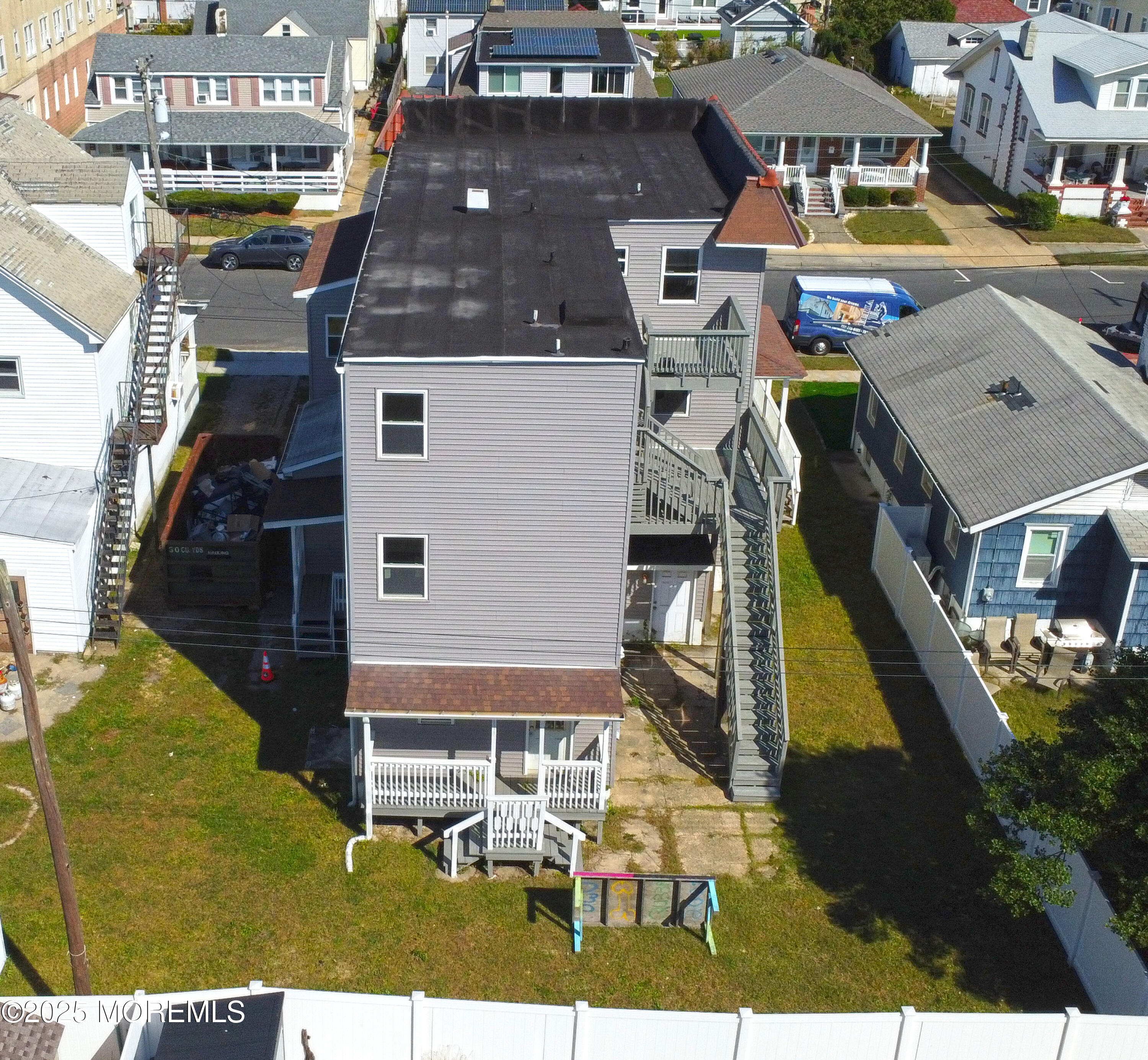 107 12th Avenue Belmar, NJ 07719 - Photo 11 of 12 an aerial view of residential houses with outdoor space