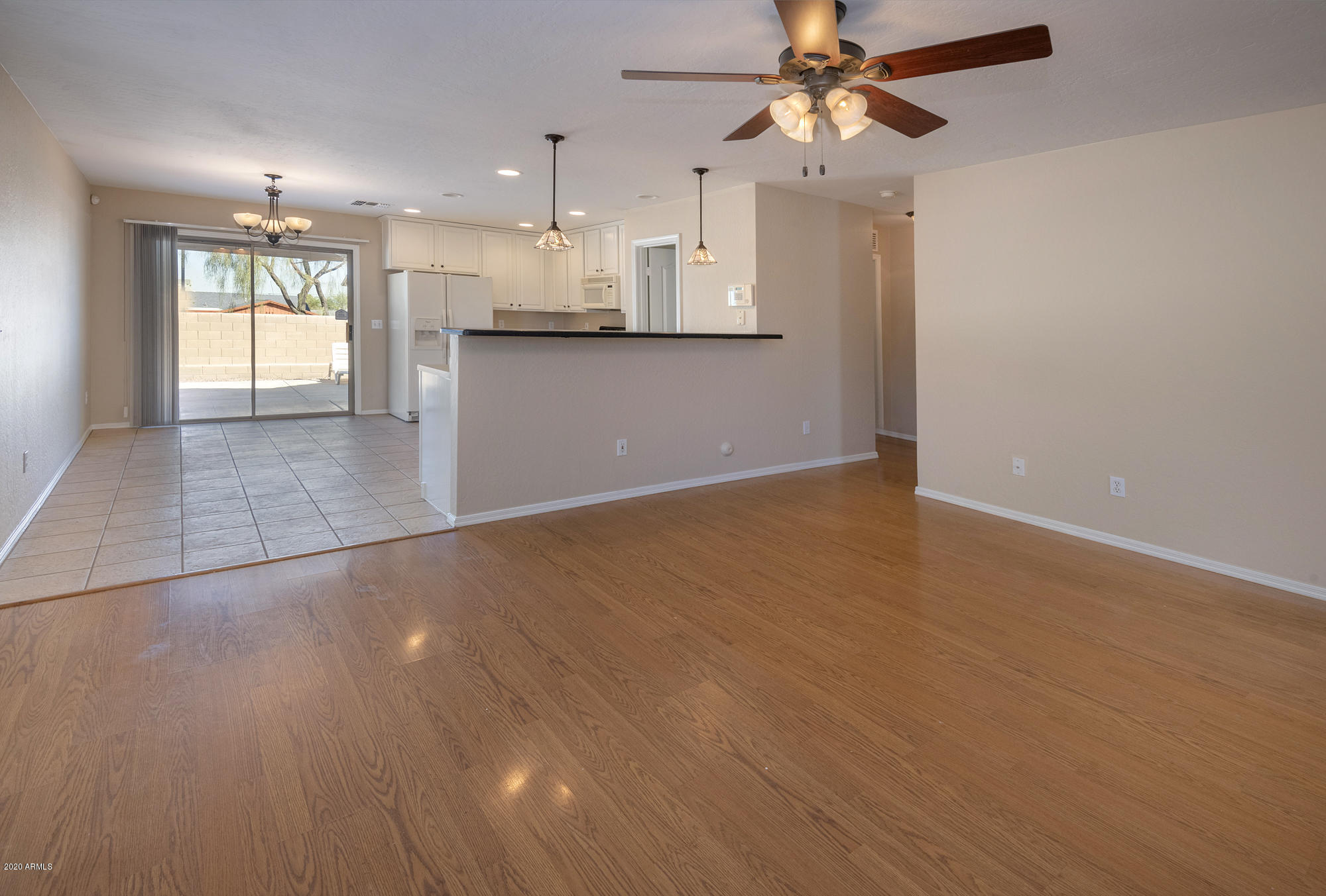 906 East Pedro Road Phoenix, AZ 85042 - Photo 8 of 28 Family Room to Master Suite