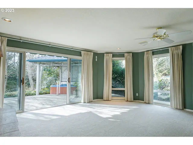 a view of a room with a large window