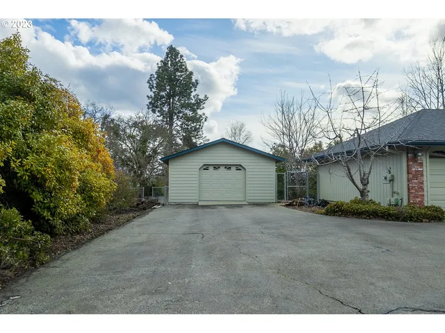 a view of outdoor space yard and garage
