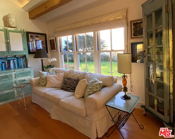 a very nice looking kitchen with a large window