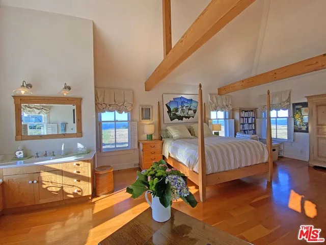 a view of a living room and dining room