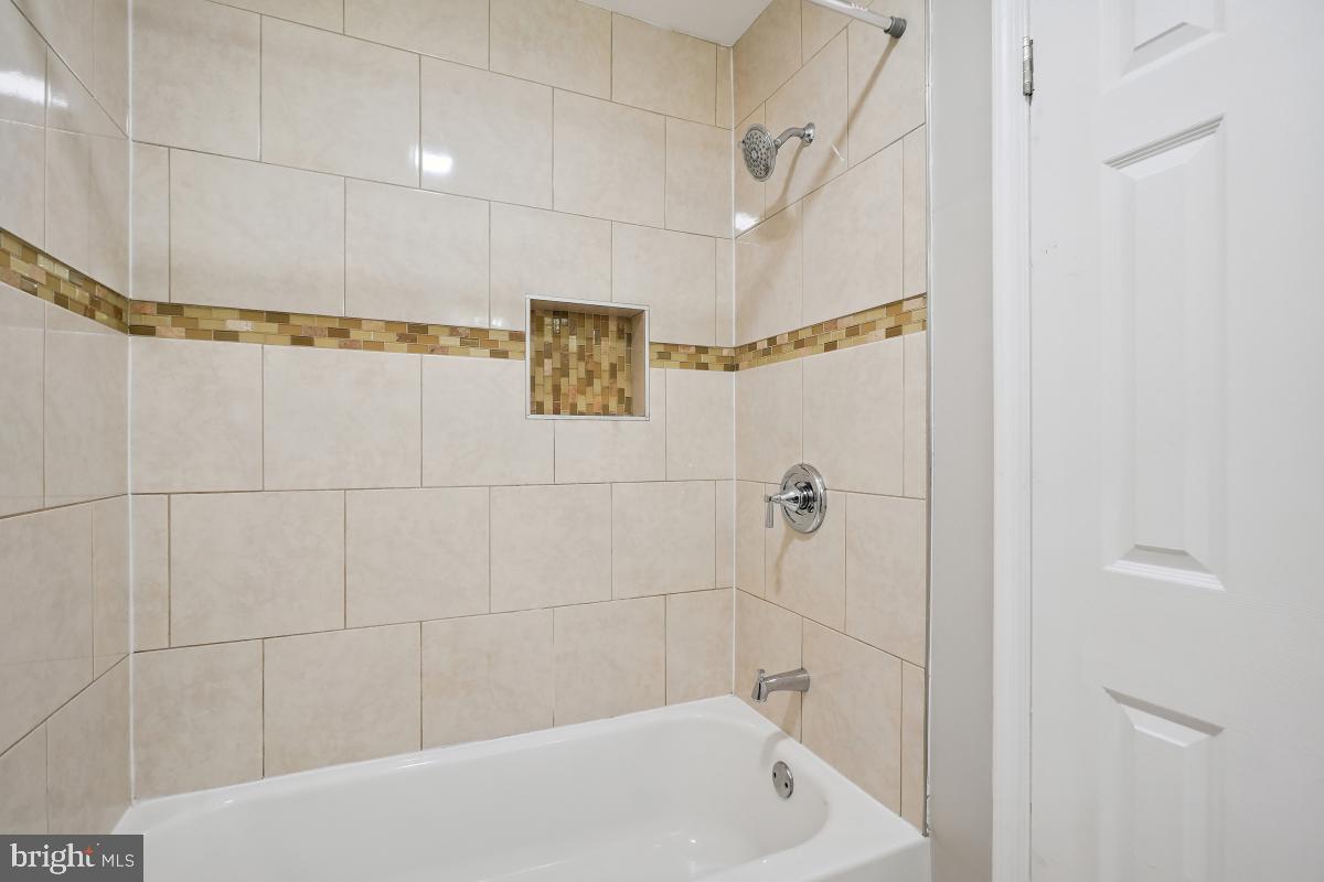 10307 Leslie Street Silver Spring, MD 20902 - Photo 20 of 46 a bathroom with a bathtub
