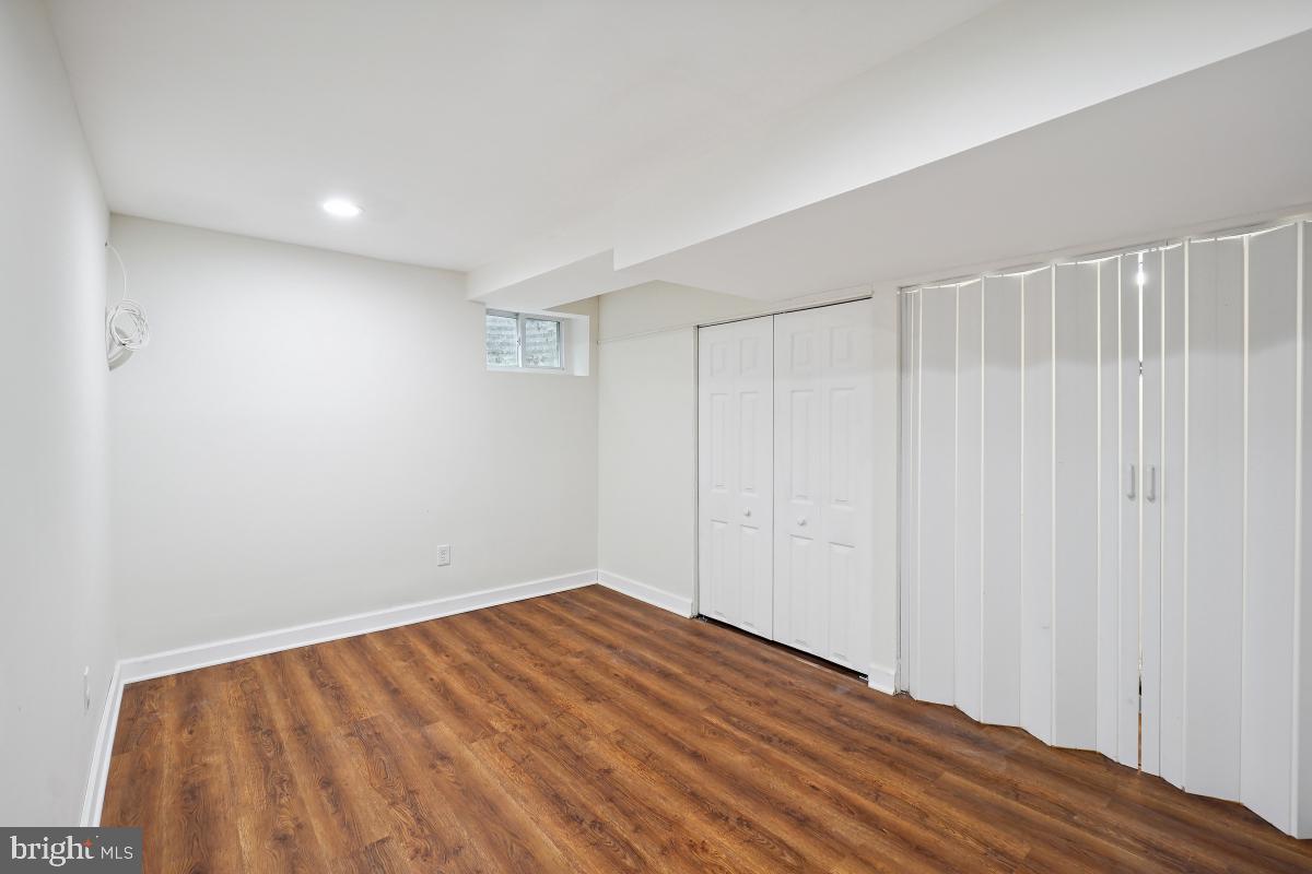 10307 Leslie Street Silver Spring, MD 20902 - Photo 38 of 46 a view of room with wooden floor
