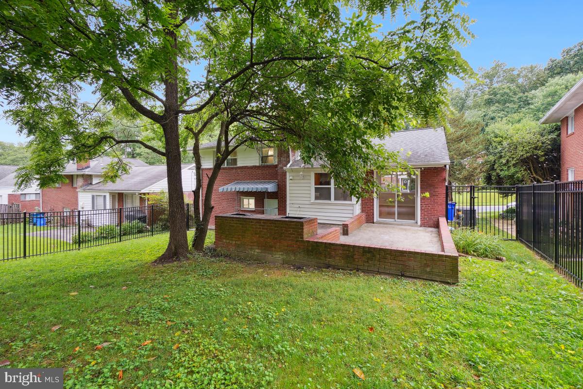 10307 Leslie Street Silver Spring, MD 20902 - Photo 46 of 46 a front view of a house with garden